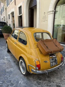 old yellow car at Casa Monti in Rome