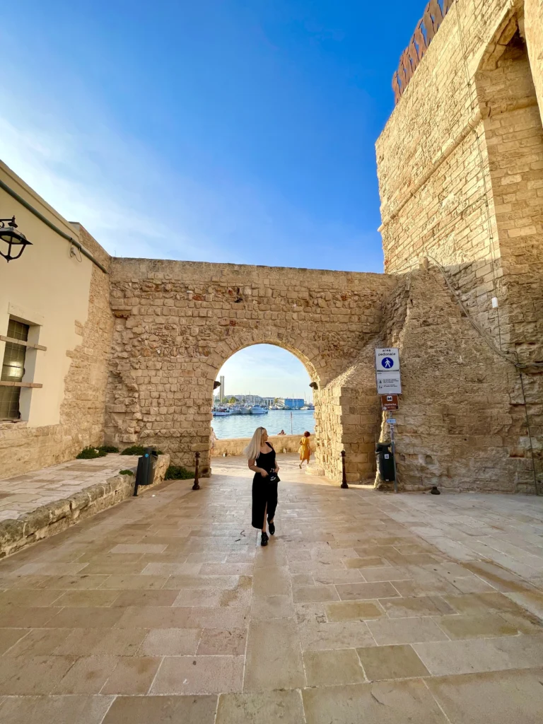 best spring destinations europe Monopoli Italy old town arch